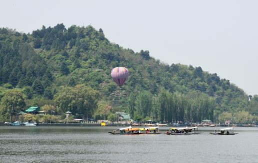 The tourism department for the first time rolled out a hot air balloon service for tourists and locals to provide them with new means of entertainment and adventure, at Zabarwan Park, in Srinagar on Tuesday.