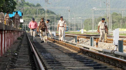 Railway Protection Force (RPF) personnel along with sniffer dogs inspect the railway track ahead of 76th Independence Day, at Railway station, in Udhampur on Tuesday.