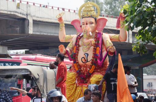 A giant idol of Lord Ganesha is being taken for immersion on Anant Chaturdashi on the last day of the 10-day long Ganesh Chaturthi festival, in Jammu on Friday.